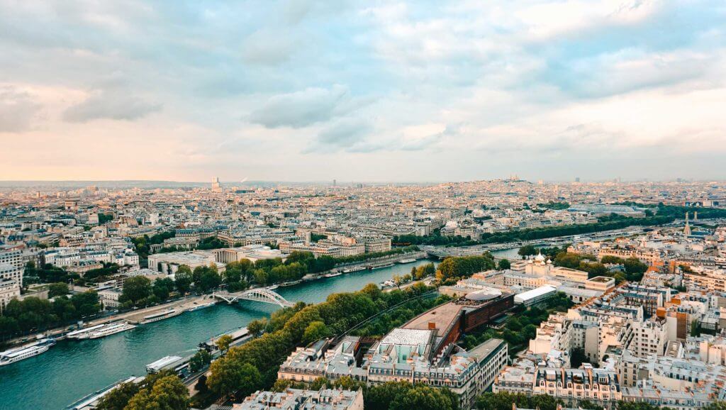 An aerial shot of French streets and waterways in Paris, France