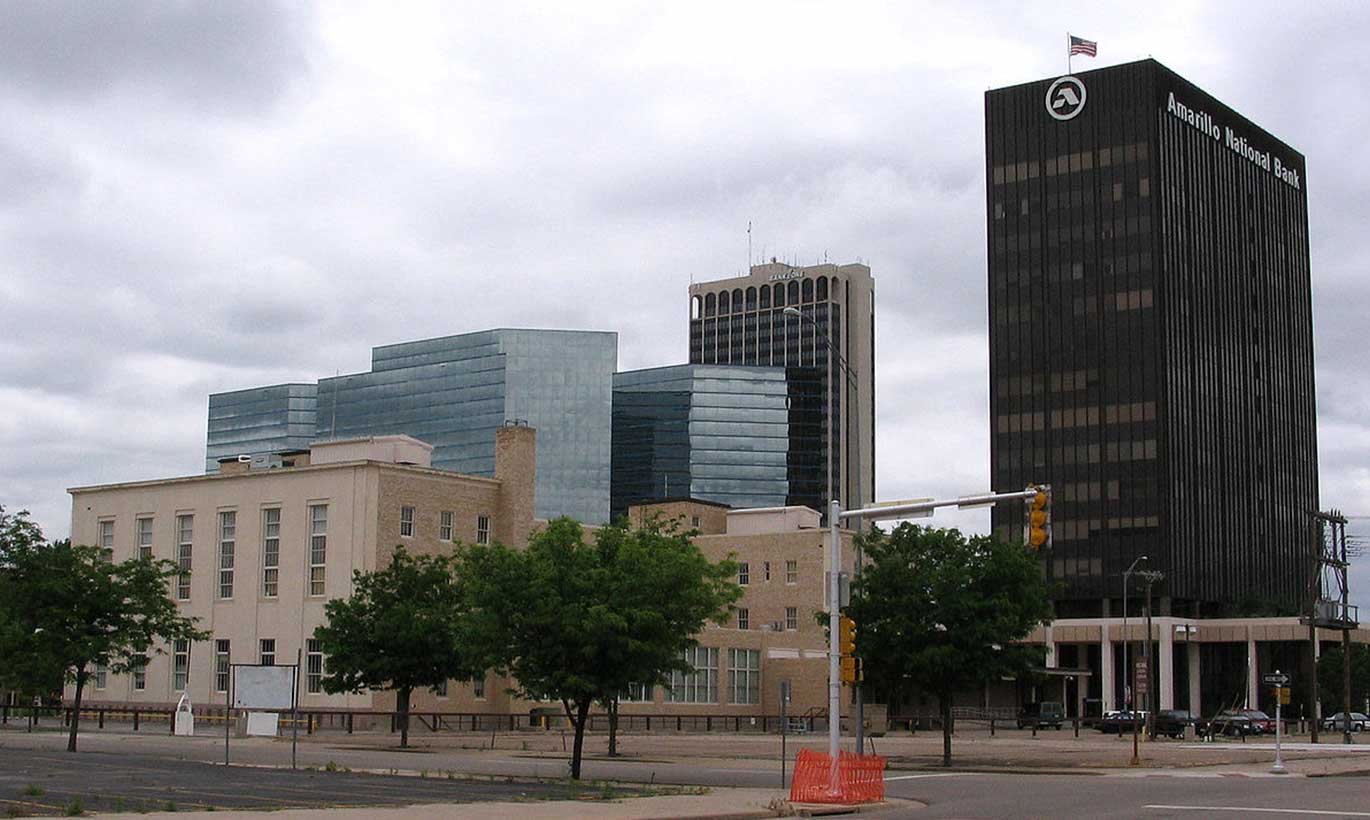 Amarillo National Bank stands tall next to other corporate buildings in downtown Amarillo, Texas.
